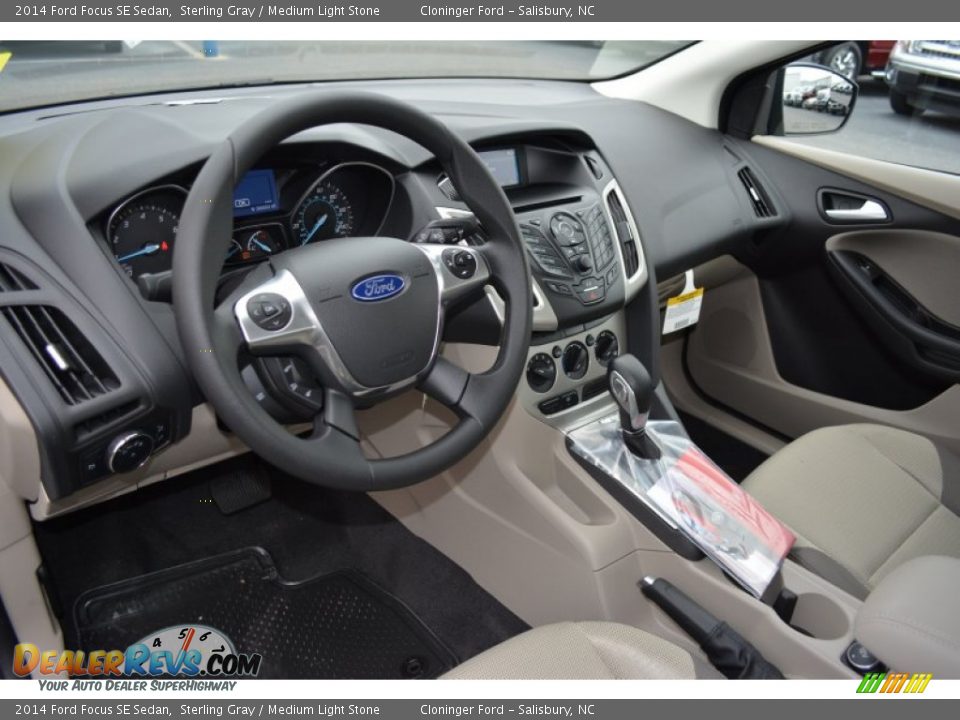 2014 Ford Focus SE Sedan Sterling Gray / Medium Light Stone Photo #7