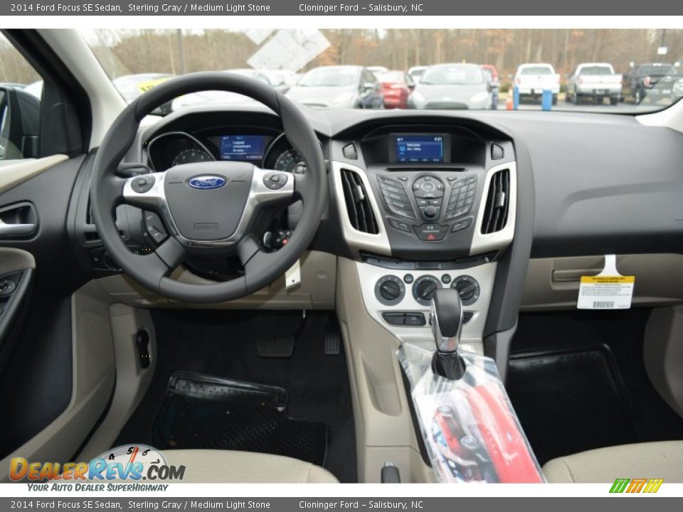 2014 Ford Focus SE Sedan Sterling Gray / Medium Light Stone Photo #8