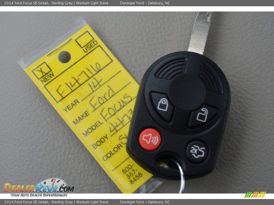 2014 Ford Focus SE Sedan Sterling Gray / Medium Light Stone Photo #20