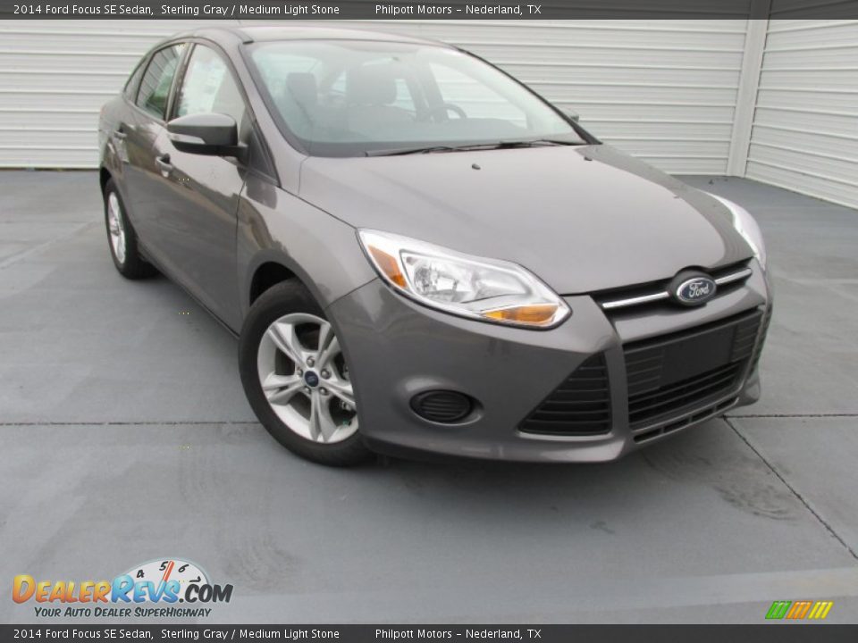 2014 Ford Focus SE Sedan Sterling Gray / Medium Light Stone Photo #1