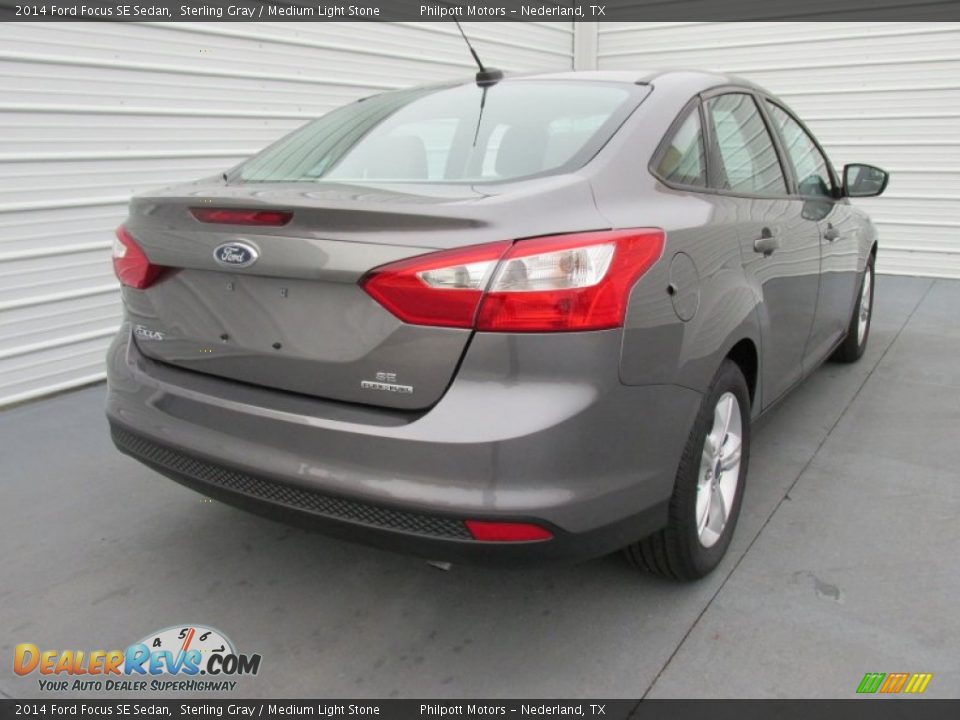 2014 Ford Focus SE Sedan Sterling Gray / Medium Light Stone Photo #4