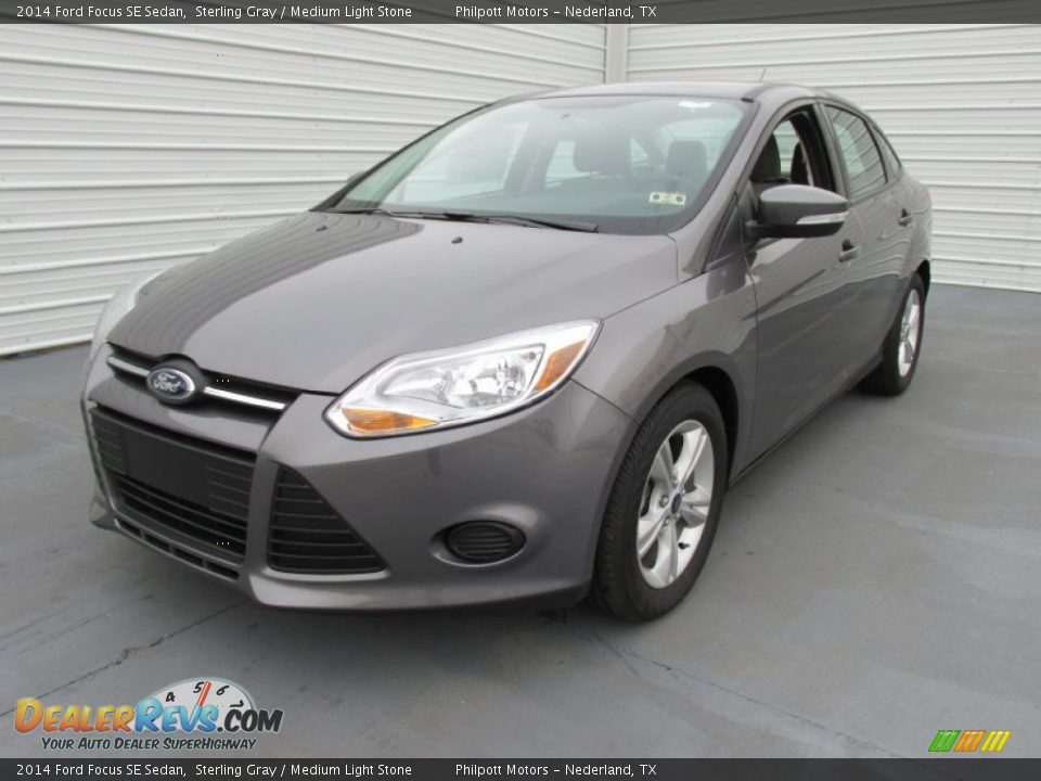 2014 Ford Focus SE Sedan Sterling Gray / Medium Light Stone Photo #7