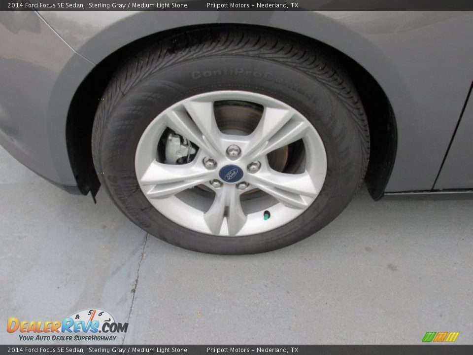 2014 Ford Focus SE Sedan Sterling Gray / Medium Light Stone Photo #11