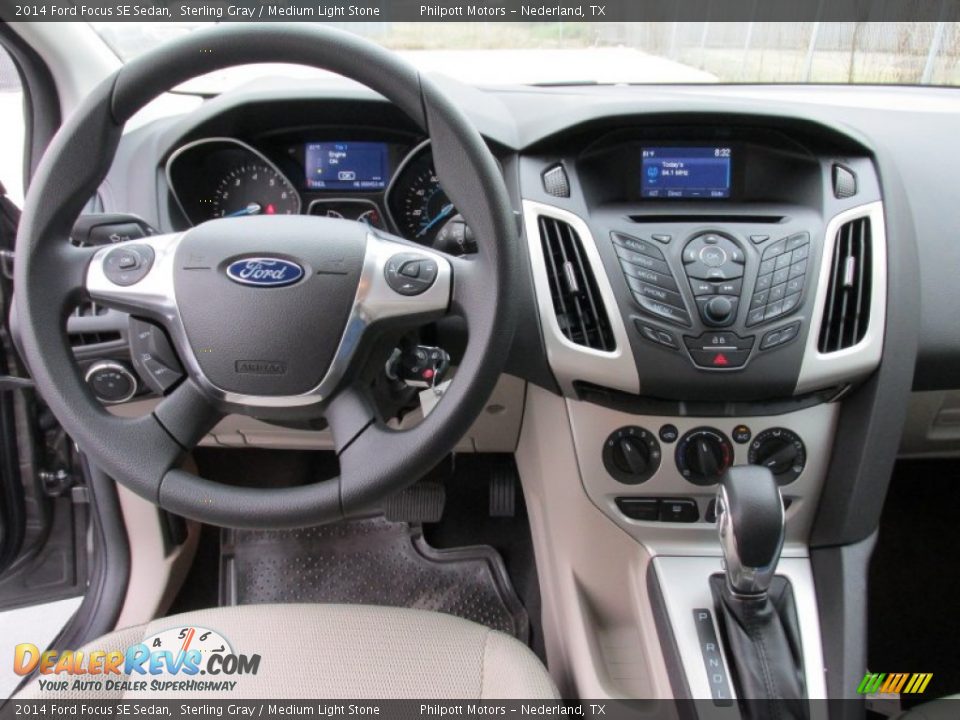 2014 Ford Focus SE Sedan Sterling Gray / Medium Light Stone Photo #24