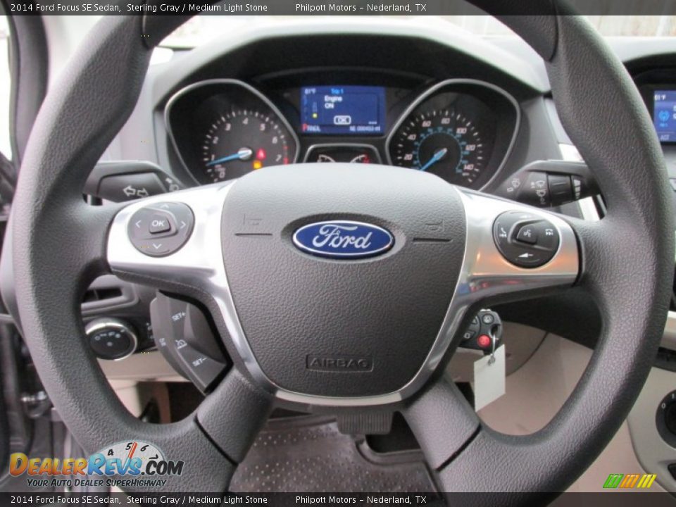 2014 Ford Focus SE Sedan Sterling Gray / Medium Light Stone Photo #29