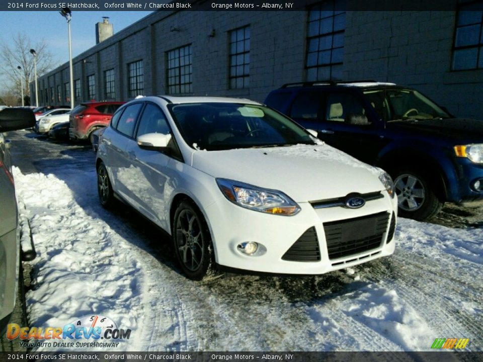 2014 Ford Focus SE Hatchback Oxford White / Charcoal Black Photo #1
