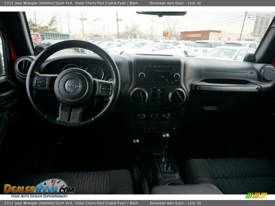 2012 Jeep Wrangler Unlimited Sport 4x4 Deep Cherry Red Crystal Pearl / Black Photo #31