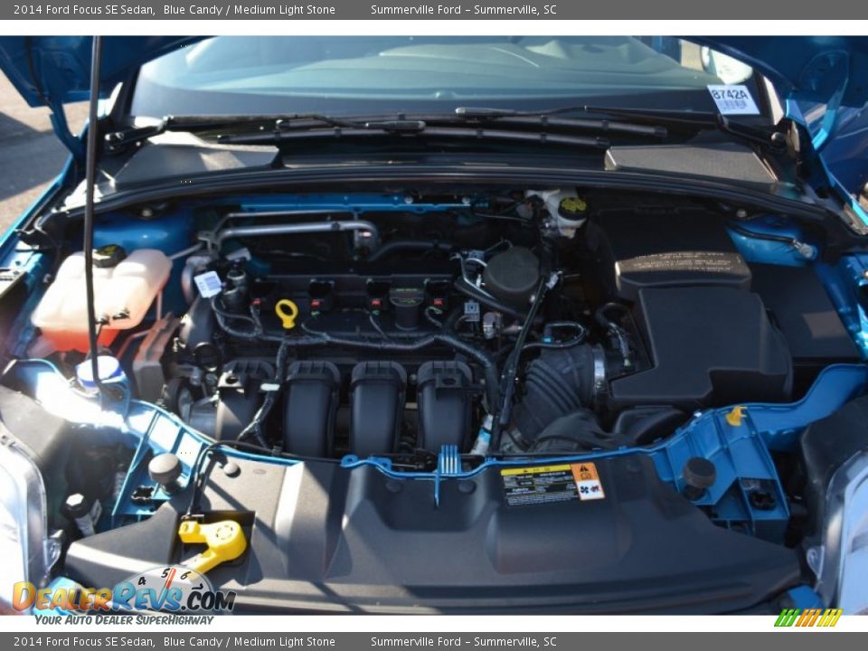 2014 Ford Focus SE Sedan Blue Candy / Medium Light Stone Photo #23