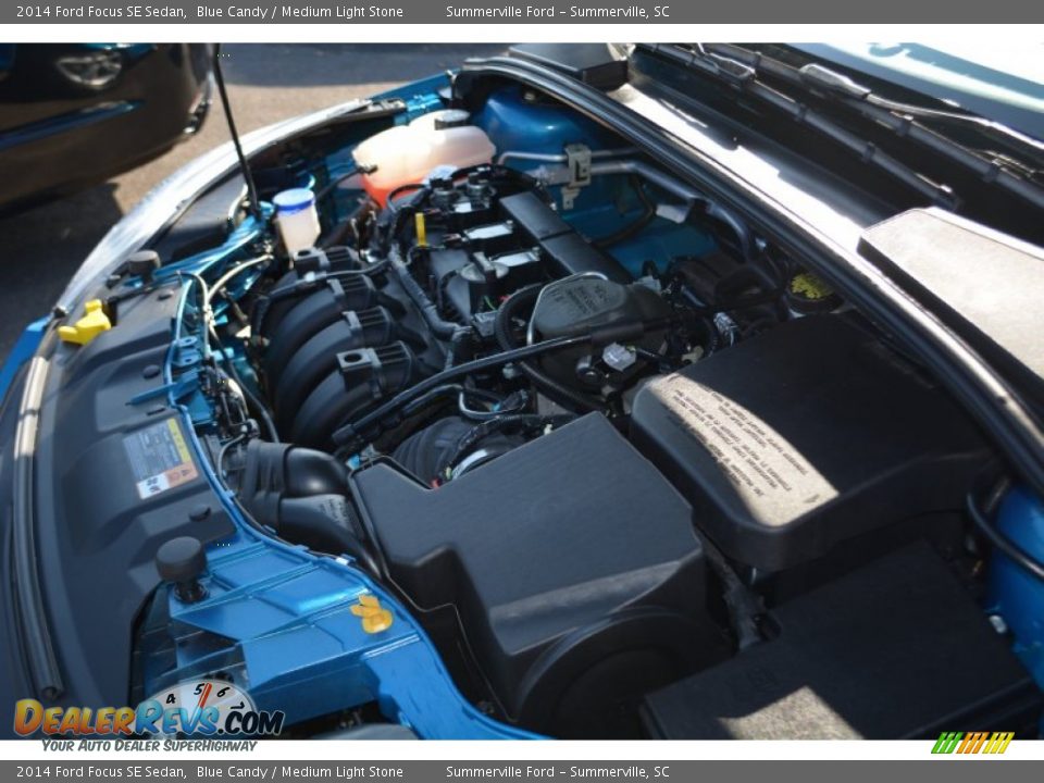 2014 Ford Focus SE Sedan Blue Candy / Medium Light Stone Photo #24
