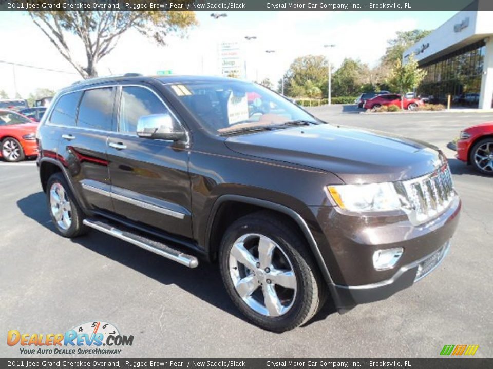 Front 3/4 View of 2011 Jeep Grand Cherokee Overland Photo #11