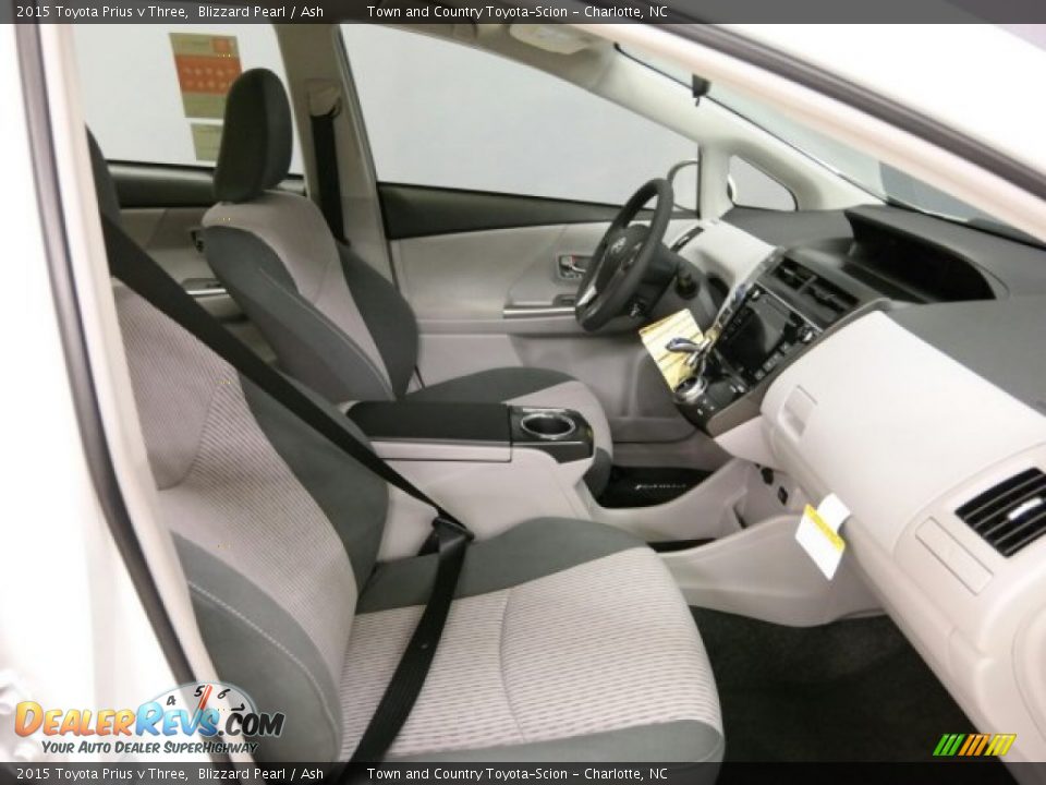 Front Seat of 2015 Toyota Prius v Three Photo #14