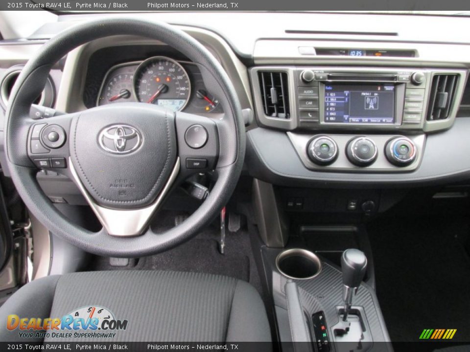Dashboard of 2015 Toyota RAV4 LE Photo #23
