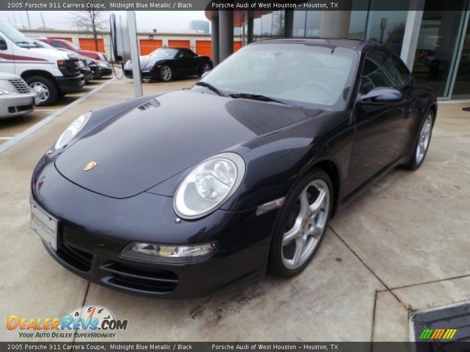 Front 3/4 View of 2005 Porsche 911 Carrera Coupe Photo #3