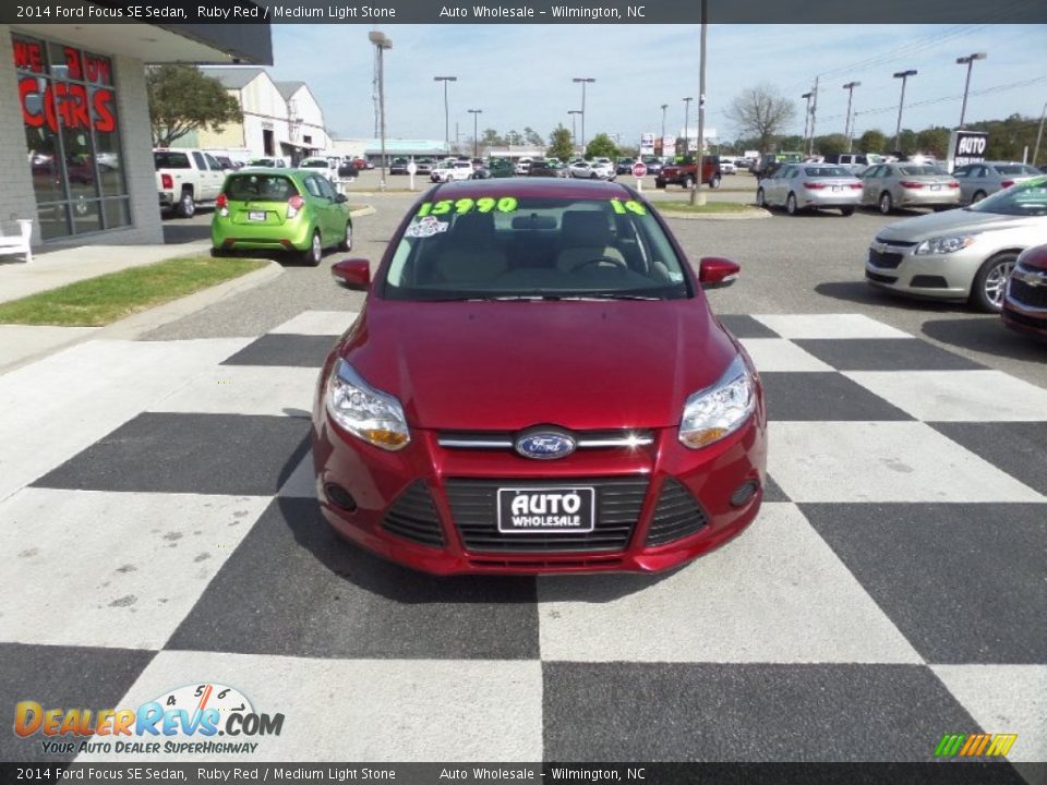 2014 Ford Focus SE Sedan Ruby Red / Medium Light Stone Photo #2