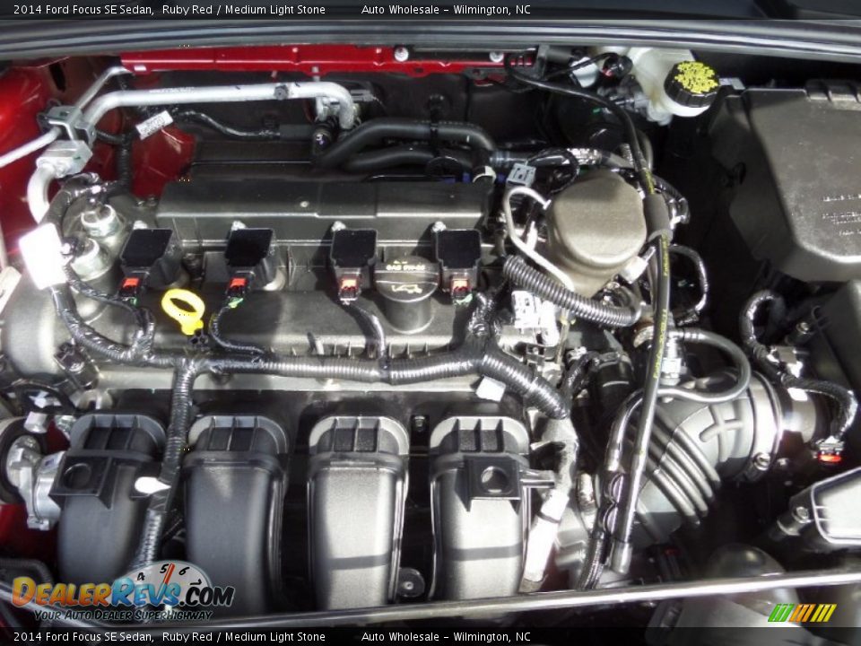 2014 Ford Focus SE Sedan Ruby Red / Medium Light Stone Photo #6