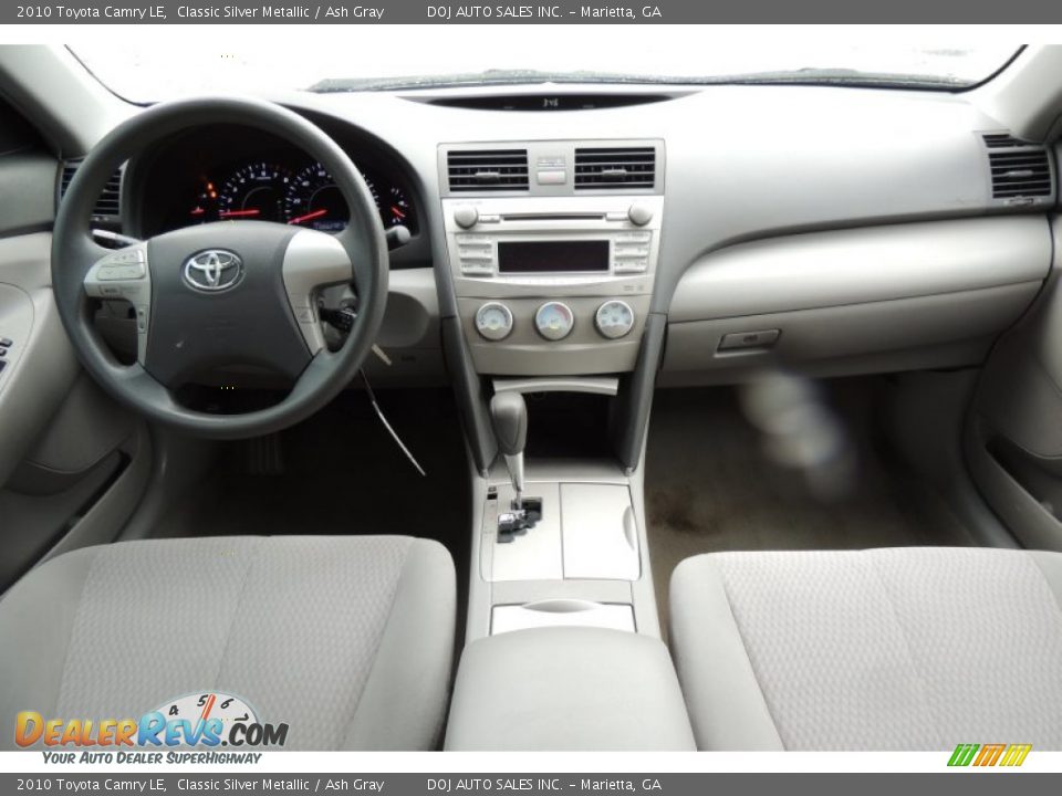 Dashboard of 2010 Toyota Camry LE Photo #11