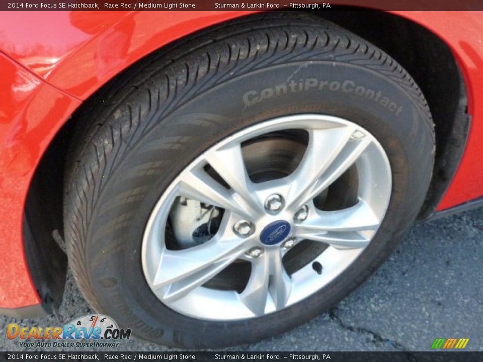 2014 Ford Focus SE Hatchback Race Red / Medium Light Stone Photo #7