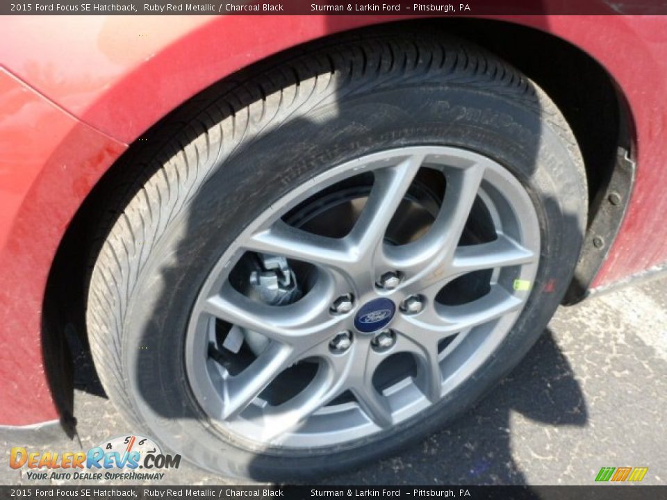 2015 Ford Focus SE Hatchback Ruby Red Metallic / Charcoal Black Photo #7