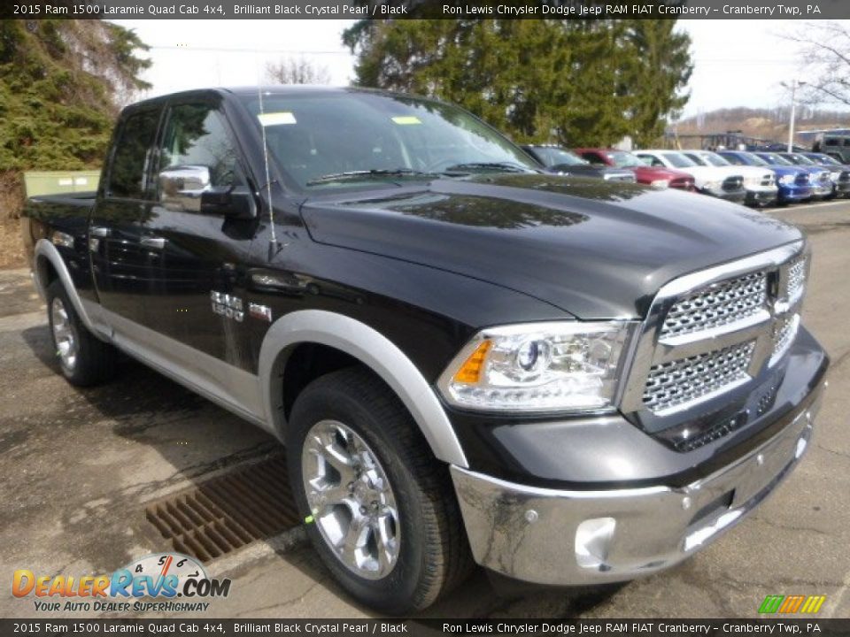 Front 3/4 View of 2015 Ram 1500 Laramie Quad Cab 4x4 Photo #9
