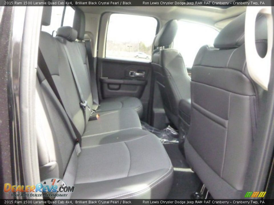 Rear Seat of 2015 Ram 1500 Laramie Quad Cab 4x4 Photo #13