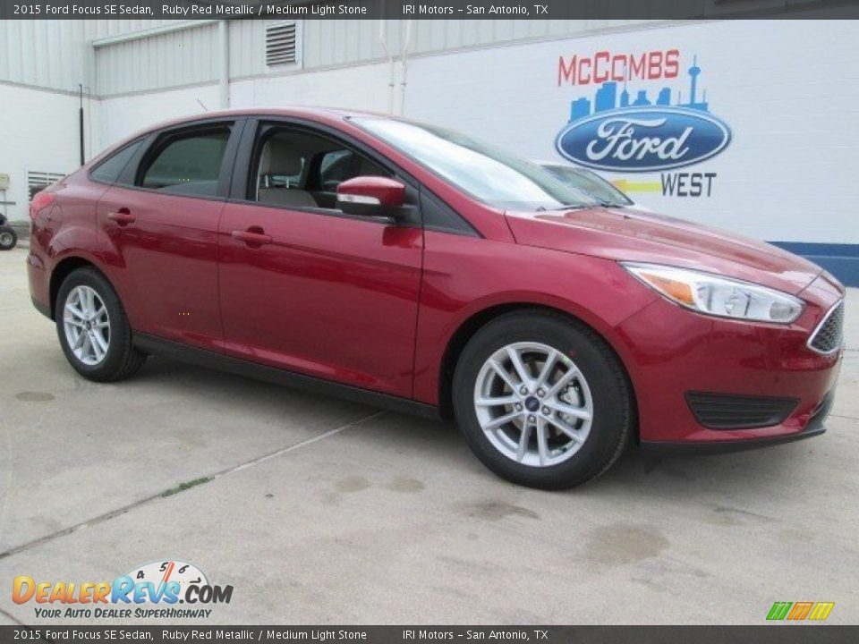 2015 Ford Focus SE Sedan Ruby Red Metallic / Medium Light Stone Photo #1