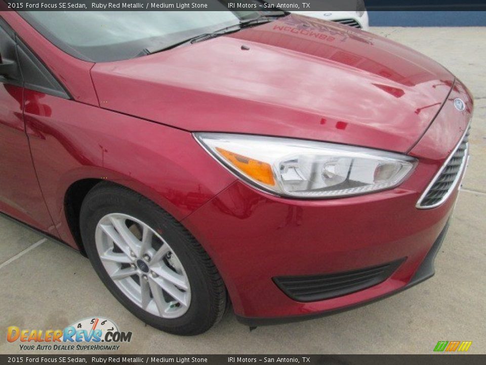 2015 Ford Focus SE Sedan Ruby Red Metallic / Medium Light Stone Photo #2