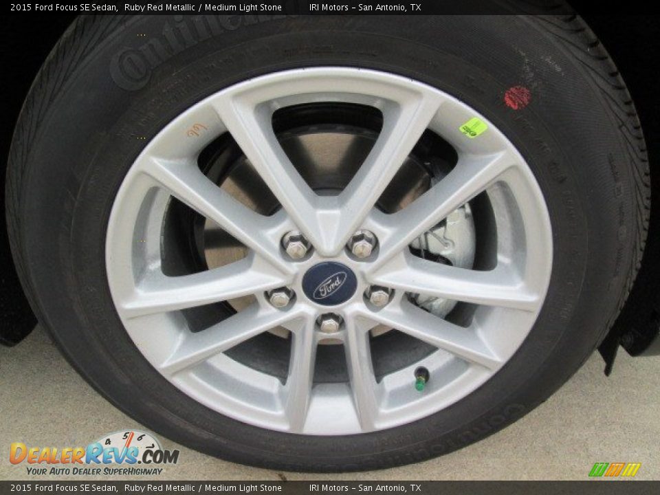2015 Ford Focus SE Sedan Ruby Red Metallic / Medium Light Stone Photo #3