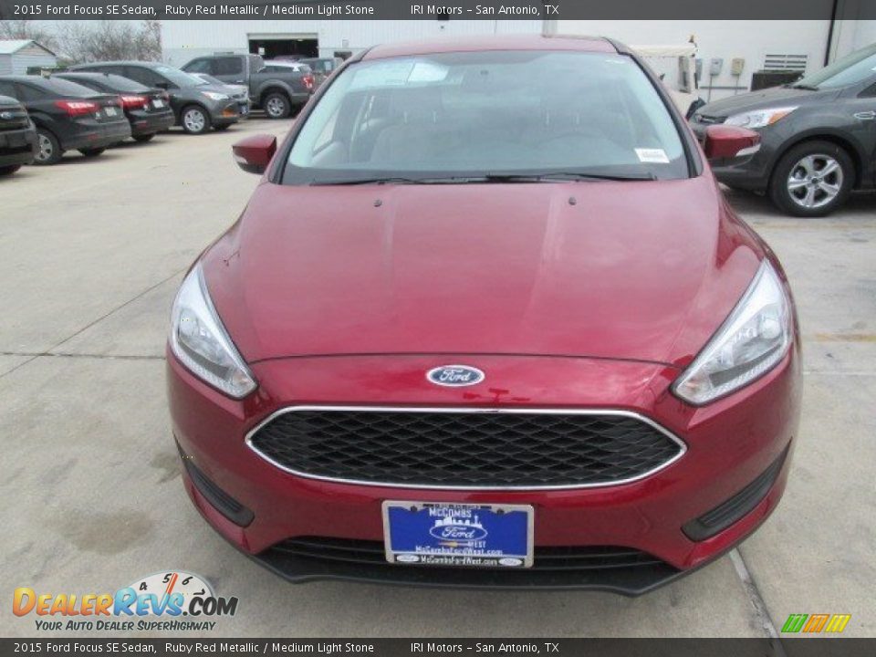 2015 Ford Focus SE Sedan Ruby Red Metallic / Medium Light Stone Photo #4