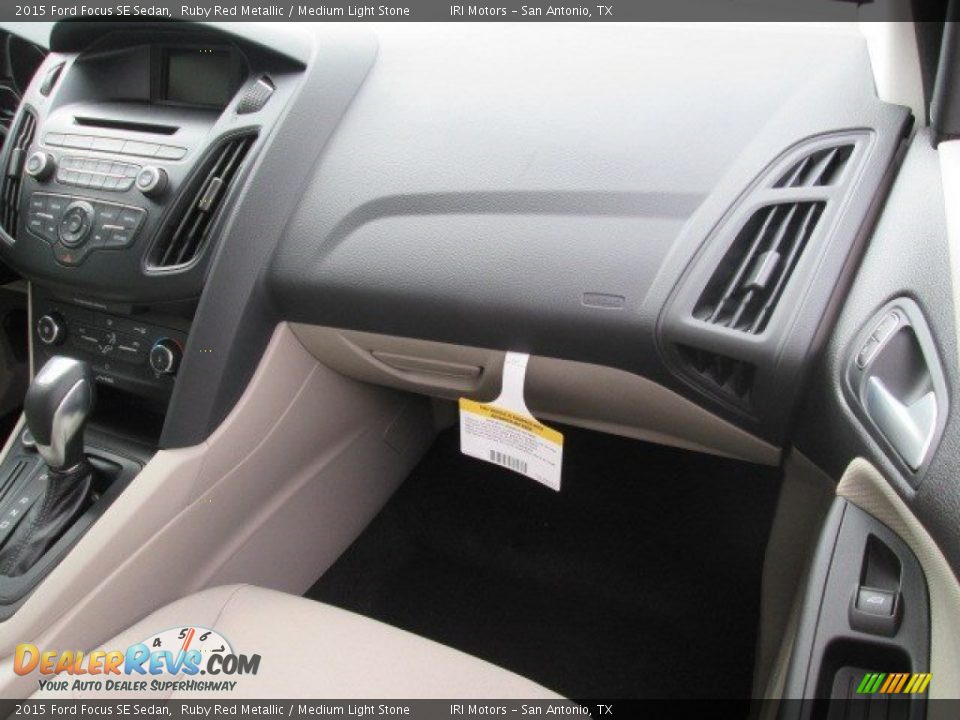 2015 Ford Focus SE Sedan Ruby Red Metallic / Medium Light Stone Photo #13