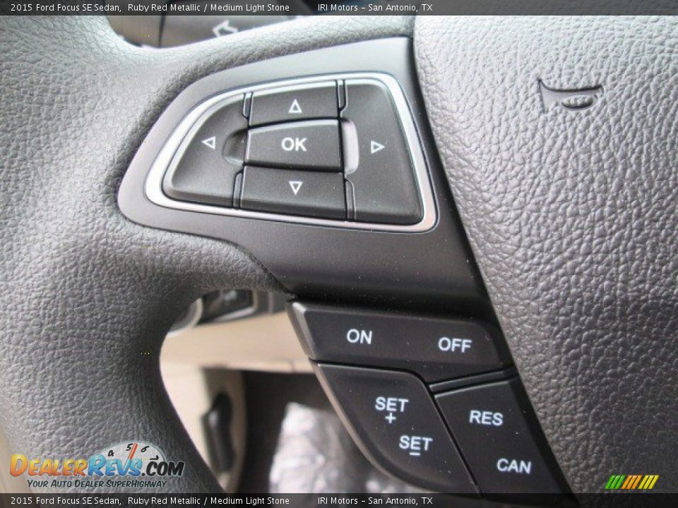 2015 Ford Focus SE Sedan Ruby Red Metallic / Medium Light Stone Photo #18