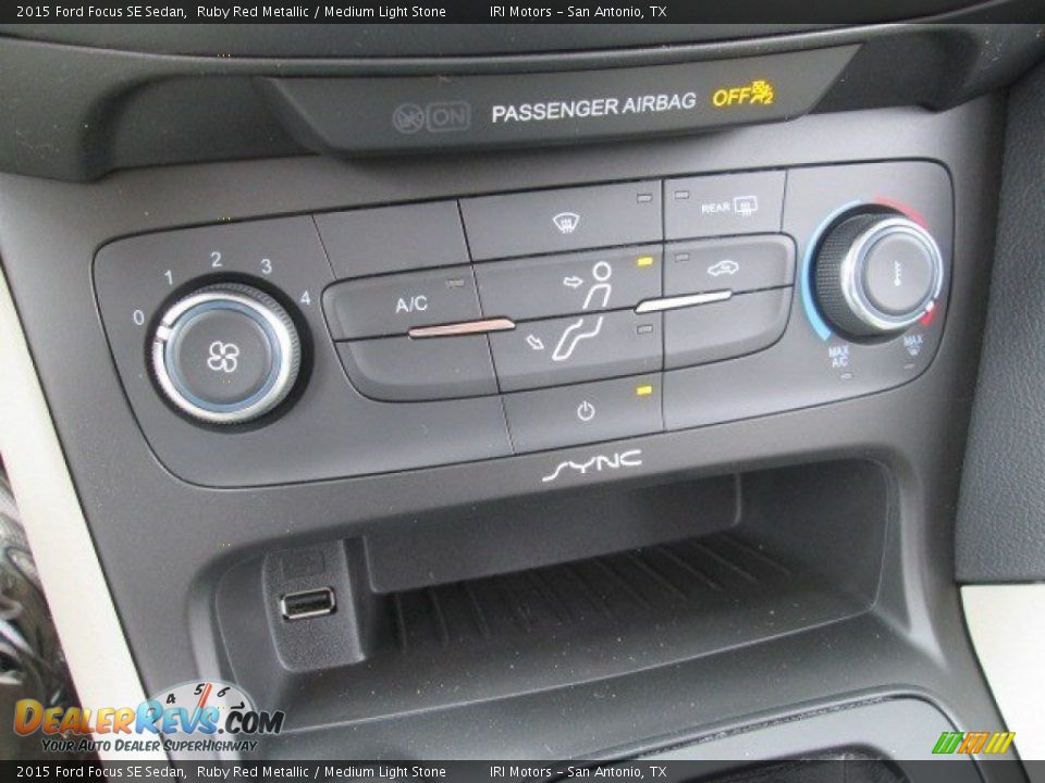 2015 Ford Focus SE Sedan Ruby Red Metallic / Medium Light Stone Photo #22