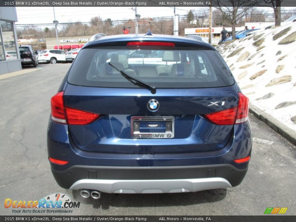 2015 BMW X1 xDrive28i Deep Sea Blue Metallic / Oyster/Orange-Black Piping Photo #5