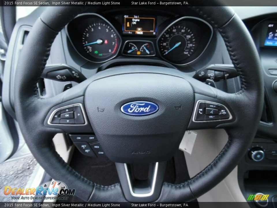 2015 Ford Focus SE Sedan Ingot Silver Metallic / Medium Light Stone Photo #14