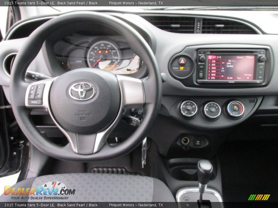 Dashboard of 2015 Toyota Yaris 5-Door LE Photo #22