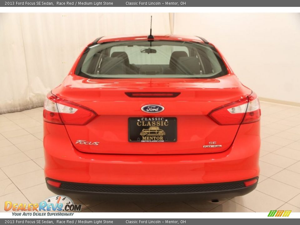 2013 Ford Focus SE Sedan Race Red / Medium Light Stone Photo #12