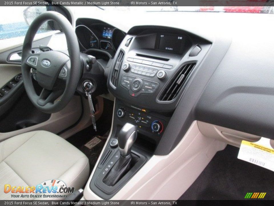 2015 Ford Focus SE Sedan Blue Candy Metallic / Medium Light Stone Photo #16