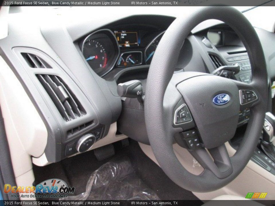 2015 Ford Focus SE Sedan Blue Candy Metallic / Medium Light Stone Photo #20