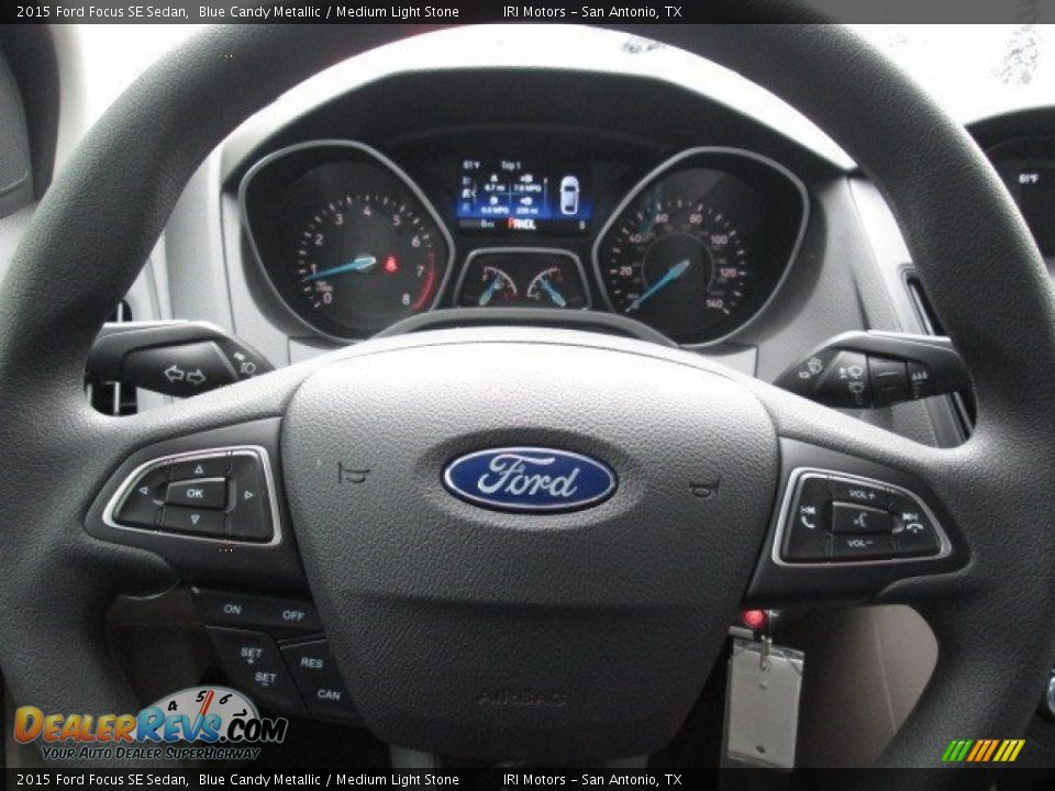 2015 Ford Focus SE Sedan Blue Candy Metallic / Medium Light Stone Photo #25