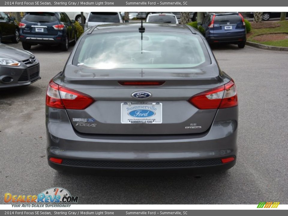 2014 Ford Focus SE Sedan Sterling Gray / Medium Light Stone Photo #4