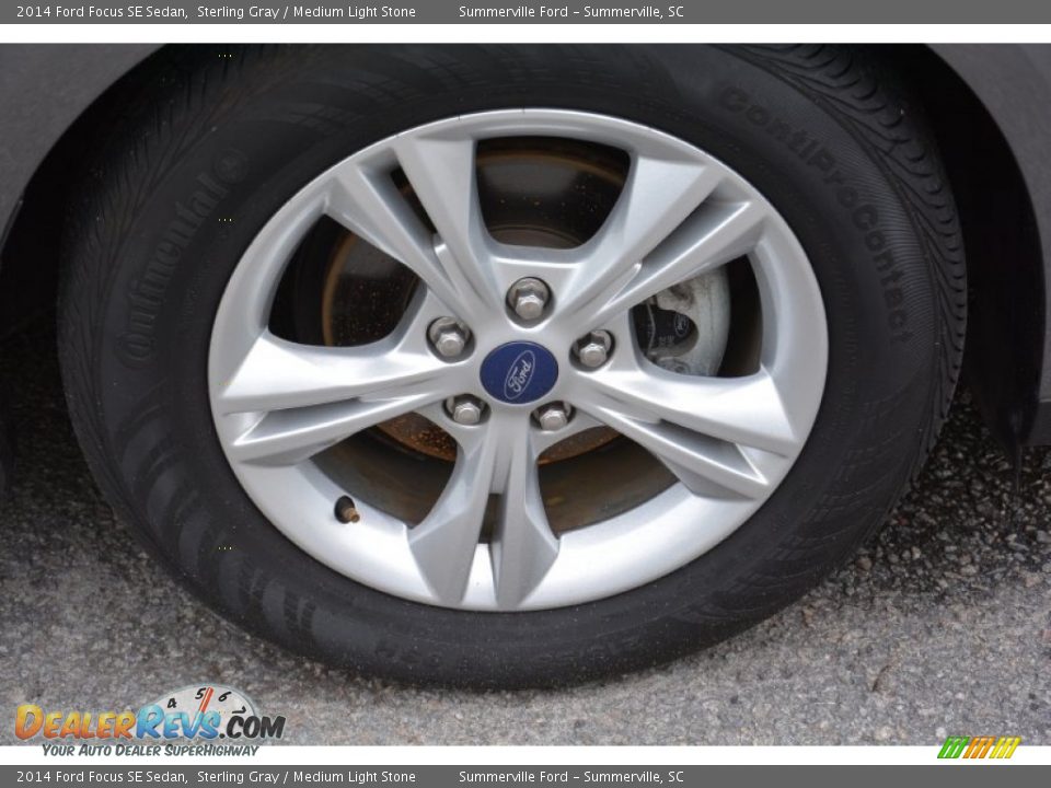 2014 Ford Focus SE Sedan Sterling Gray / Medium Light Stone Photo #21