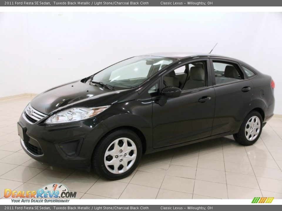 Front 3/4 View of 2011 Ford Fiesta SE Sedan Photo #3