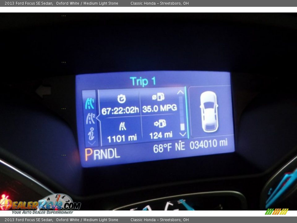 2013 Ford Focus SE Sedan Oxford White / Medium Light Stone Photo #24