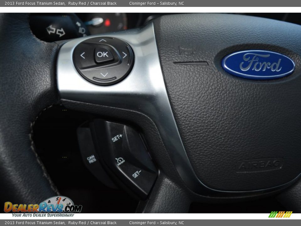 2013 Ford Focus Titanium Sedan Ruby Red / Charcoal Black Photo #28