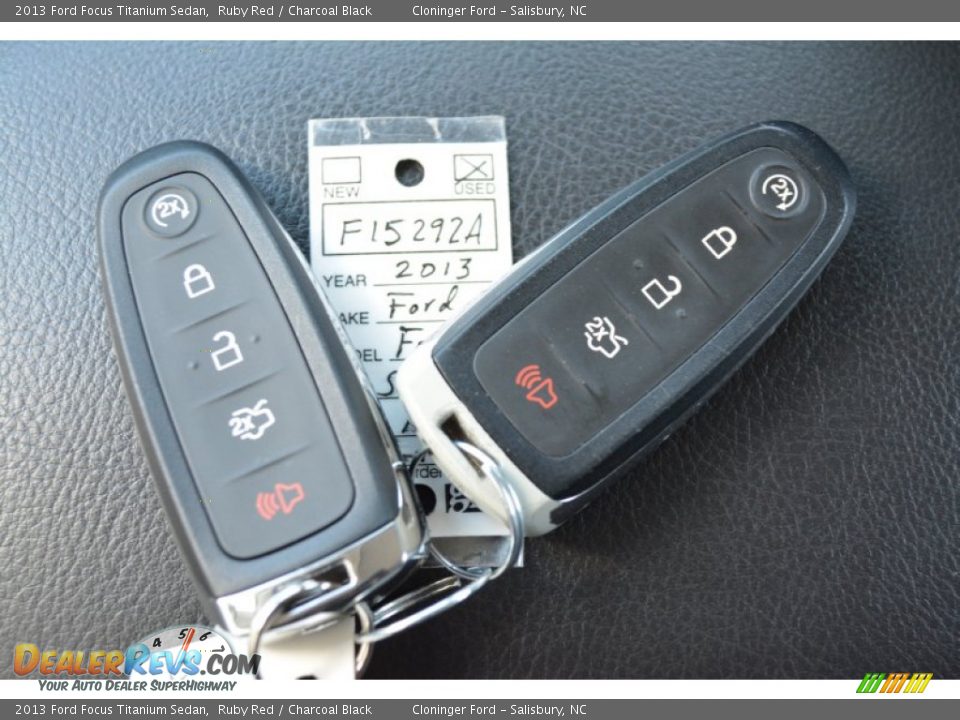 2013 Ford Focus Titanium Sedan Ruby Red / Charcoal Black Photo #34