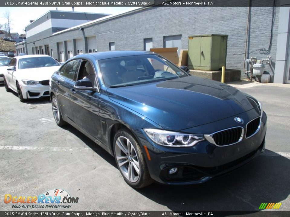 Front 3/4 View of 2015 BMW 4 Series 428i xDrive Gran Coupe Photo #8