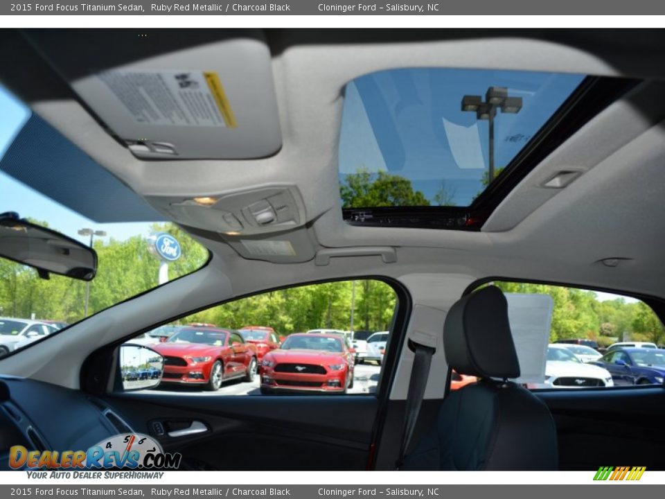 2015 Ford Focus Titanium Sedan Ruby Red Metallic / Charcoal Black Photo #12