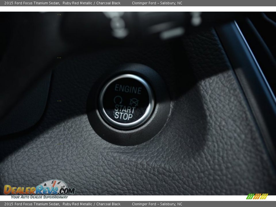 2015 Ford Focus Titanium Sedan Ruby Red Metallic / Charcoal Black Photo #24