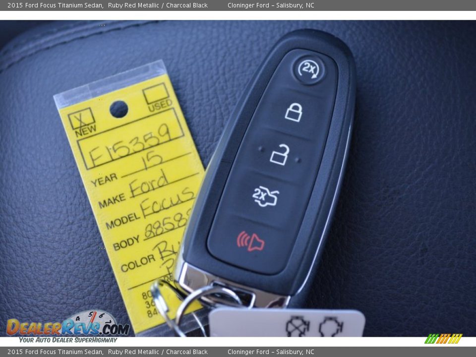 2015 Ford Focus Titanium Sedan Ruby Red Metallic / Charcoal Black Photo #25
