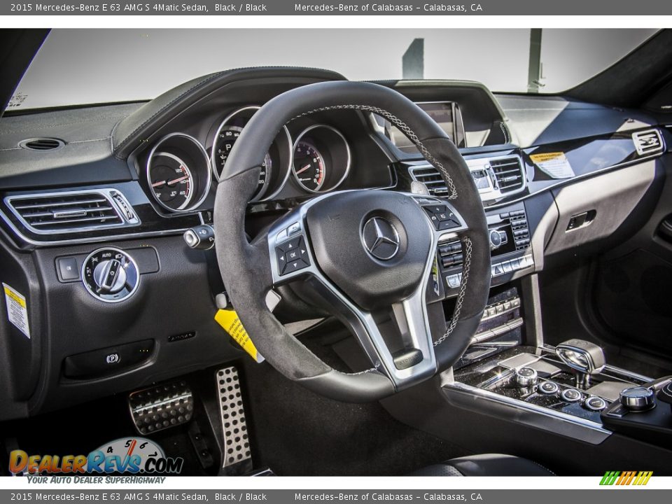 Dashboard of 2015 Mercedes-Benz E 63 AMG S 4Matic Sedan Photo #5