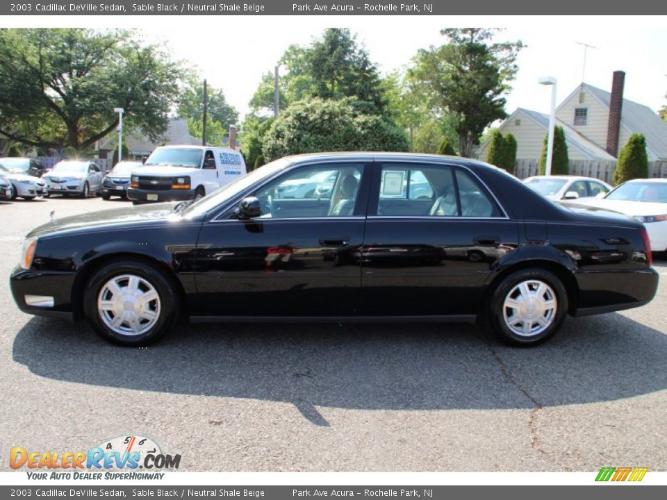 2003 Cadillac DeVille Sedan Sable Black / Neutral Shale Beige Photo #6